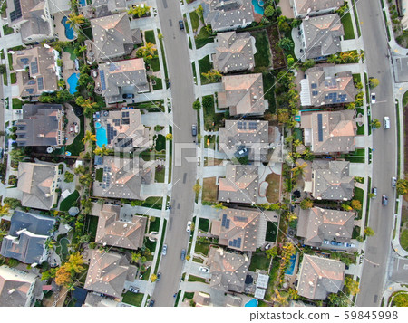 Aerial top view of residential modern subdivision during sunset 59845998