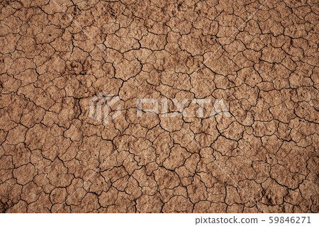Dry cracked soil during drought 59846271