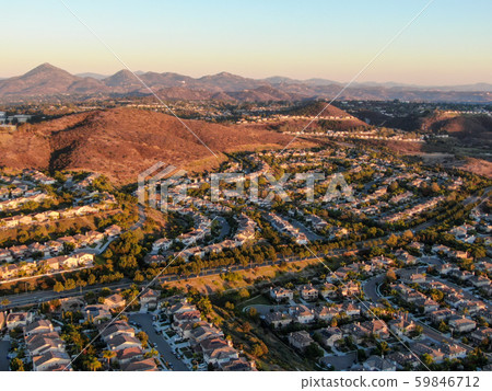 Aerial view of residential modern subdivision during sunset Aerial view of residential modern subdivision during sunset 59846712