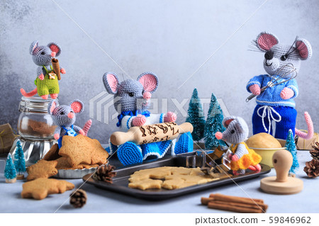 Knitted mouse family is cooking cookies. Year of rat. symbol of 2020. 59846962