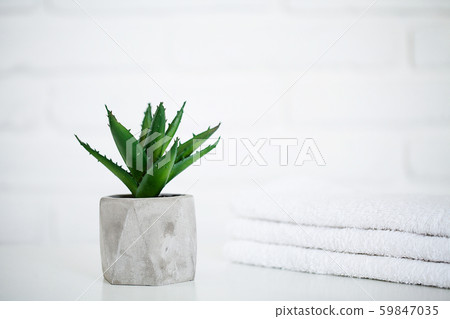 White towels on white table with copy space on bath room background 59847035