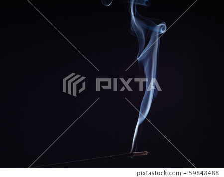 Steam of white smoke from burning incense 59848488