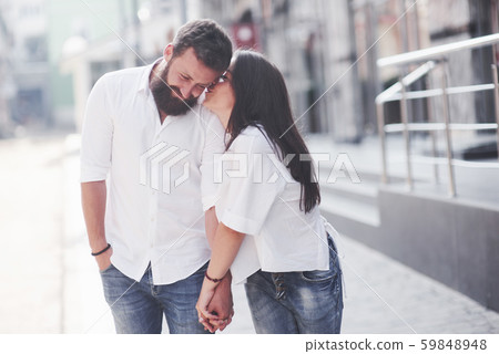 Beautiful happy couple hugging on the city street.Lifestyle concept love and romance 59848948
