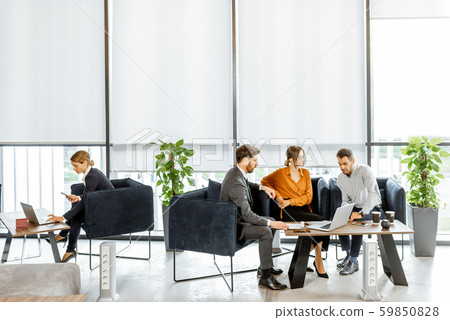Young couple with financial advisor at the office Young couple with financial advisor at the office 59850828