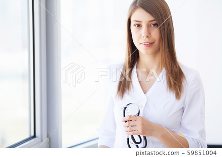 Medicine. Young female doctor in modern clinic Medicine. Young female doctor in modern clinic 59851004