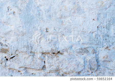 Blue plastered repeatedly brick wall texture. Whitewash Brick wall facade building surface. White 59852164