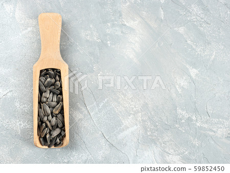 Sunflower seeds in scoop Sunflower seeds in scoop 59852450