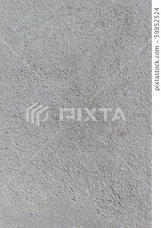 Gray textured cement wall background with fine concrete chips. Construction backgrounds Gray textured cement wall background with fine concrete chips. Construction backgrounds 59852524