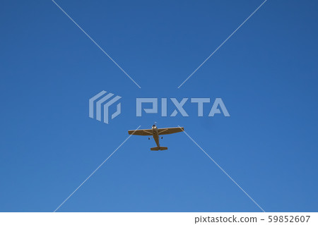 Small aircraft just after takeoff 59852607