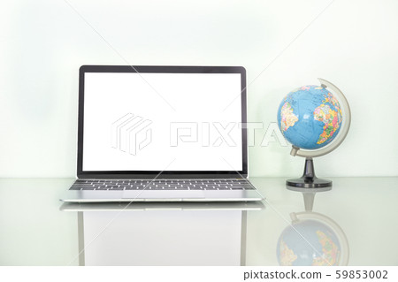 Laptop mockup and simulated world on table 59853002