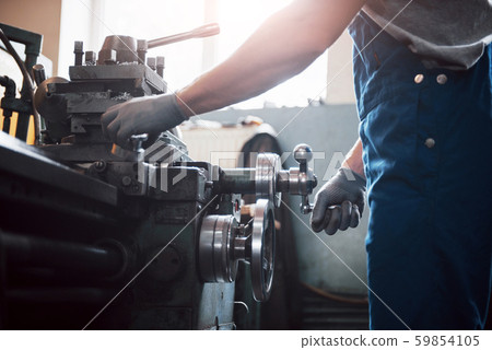 Experienced operator in a hard hat. Metalworking industry concept professional engineer metalworker 59854105