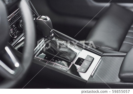 Detail of modern car interior, gear stick, automatic transmission in expensive car. 59855057