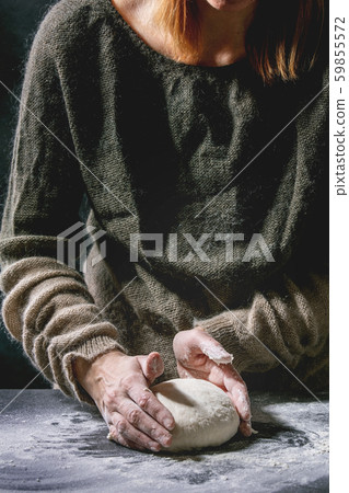 Making bread dough 59855572