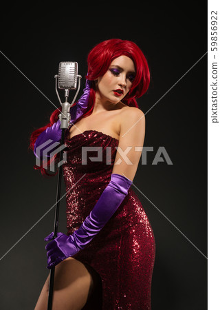 Young redhead woman retro style singer. Vintage Young redhead woman retro style singer. Vintage 59856922