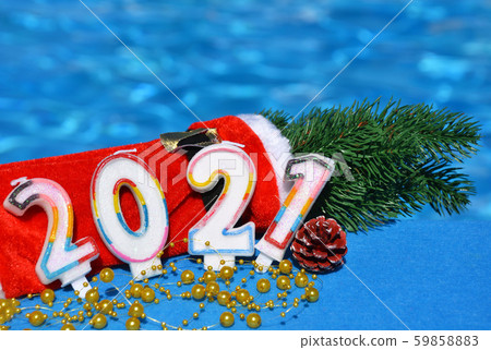 Christmas decorations and pine branch 2021. Christmas decorations and pine branch 2021. 59858883
