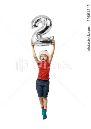 Silver inflatable number 2 in the hands of a Silver inflatable number 2 in the hands of a 59861245