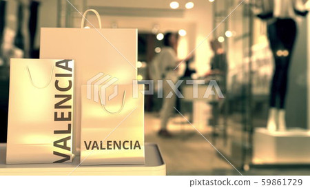 Bags with Valencia text. Shopping in Spain related 3D rendering Bags with Valencia text. Shopping in Spain related 3D rendering 59861729