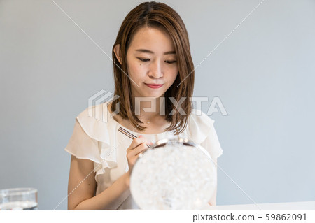 Woman doing makeup, lashes, mascara Woman doing makeup, lashes, mascara 59862091