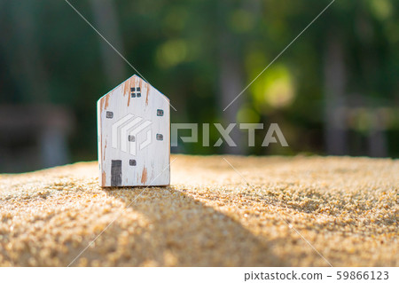 Closed up tiny home model on green grass with 59866123