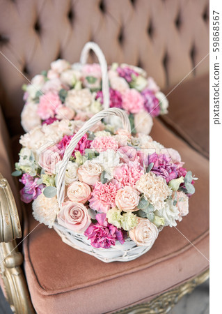 Delivery fresh cut flower from online store. Two Flowers arrangements in Wicker basket. Modern 59868567