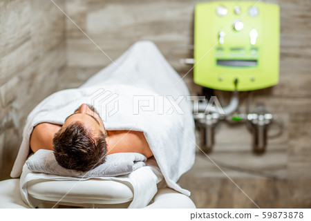 Man before the hydrocolonotherapy in the SPA salon 59873878