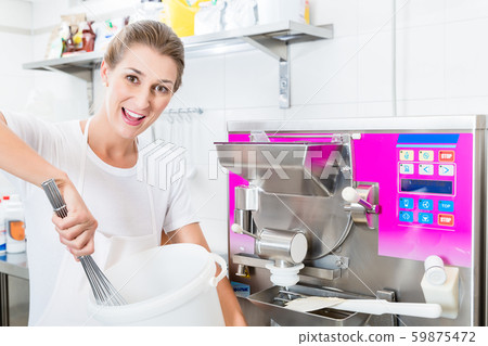 Ice cream maker in her shop 59875472