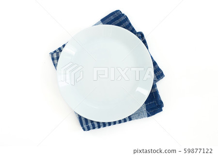 Empty plate on dark stone background. Empty plate on dark stone background. 59877122