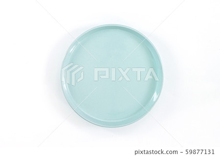 Empty plate on dark stone background. Empty plate on dark stone background. 59877131