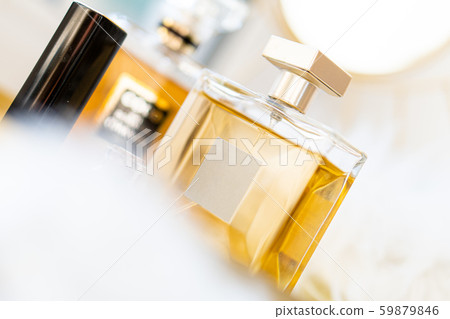 Two bottles of perfume with blank labels and luxurious beauty accessories Two bottles of perfume with blank labels and luxurious beauty accessories 59879846