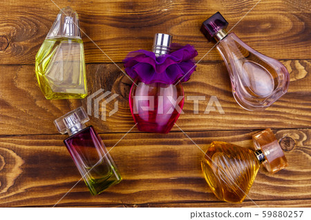 Different bottles of perfume Different bottles of perfume 59880257