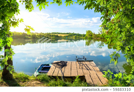 Wooden pier and pond Wooden pier and pond 59883310