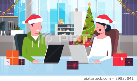 businesspeople in santa hats sitting at workplace with present gift boxes merry christmas happy new 59883841