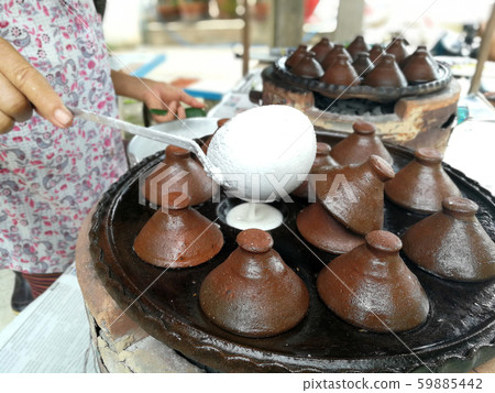 kind of Thai sweetmeat . Coconut milk mix with kind of Thai sweetmeat . Coconut milk mix with 59885442