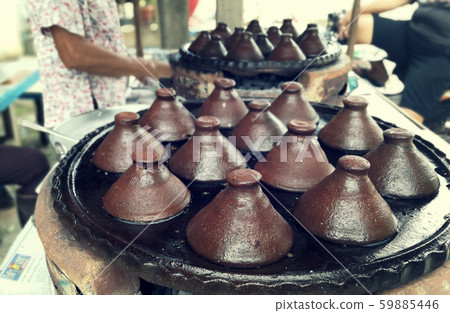 kind of Thai sweetmeat . Coconut milk mix with 59885446