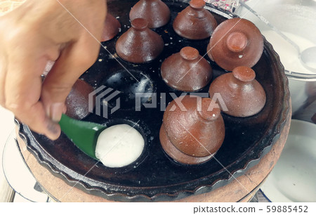 kind of Thai sweetmeat . Coconut milk mix with kind of Thai sweetmeat . Coconut milk mix with 59885452