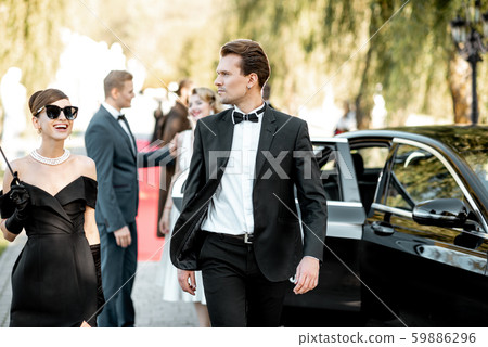 Movie actors on awards ceremony outdoors Movie actors on awards ceremony outdoors 59886296
