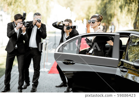 Photo reporters photographing actress ariving on the awards ceremony Photo reporters photographing actress ariving on the awards ceremony 59886423