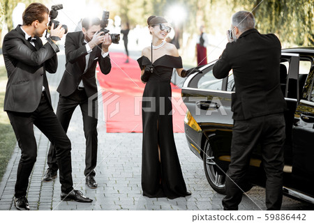 Photo reporters photographing actress ariving on the awards ceremony 59886442