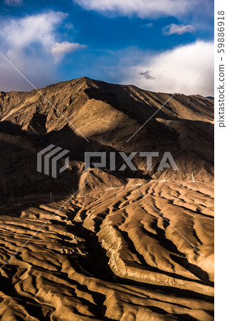 Aerial view of Snow Mountain and light of sunrise on the top himalaya mountains from the plane Aerial view of Snow Mountain and light of sunrise on the top himalaya mountains from the plane 59886918