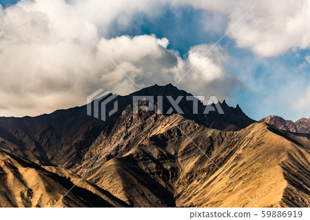 Aerial view of Snow Mountain and light of sunrise on the top himalaya mountains from the plane Aerial view of Snow Mountain and light of sunrise on the top himalaya mountains from the plane 59886919