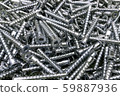 Mounts for cabinet furniture. Coupling element for connecting parts. Screws for the background. 59887936