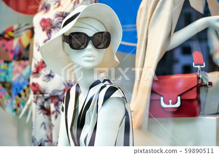 Stylish glamor female mannequin dressed in black dress 59890511