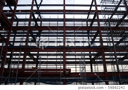 Construction site where scaffolding began to be assembled 59892241