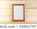 Vertical wooden mockup frames on a light 59892797