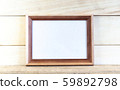 Horizontal wooden mockup frames on a light 59892798