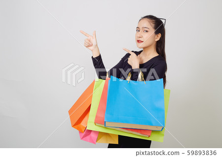 Young asia woman with colorful shopping bags 59893836