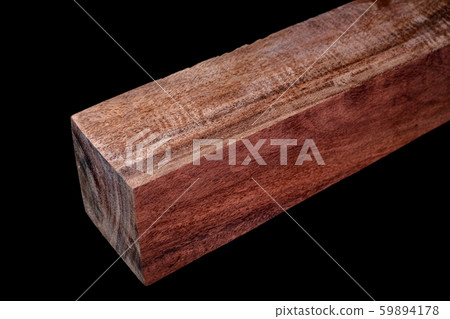 Logs of red wood beautiful pattern for crafts at the black background Logs of red wood beautiful pattern for crafts at the black background 59894178