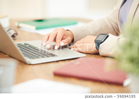 Businesswoman Using Laptop Closeup Businesswoman Using Laptop Closeup 59894195