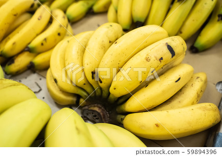 banana fruit stacked on the marketplace banana fruit stacked on the marketplace 59894396