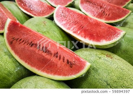 watermelon stacked on the marketplace 59894397